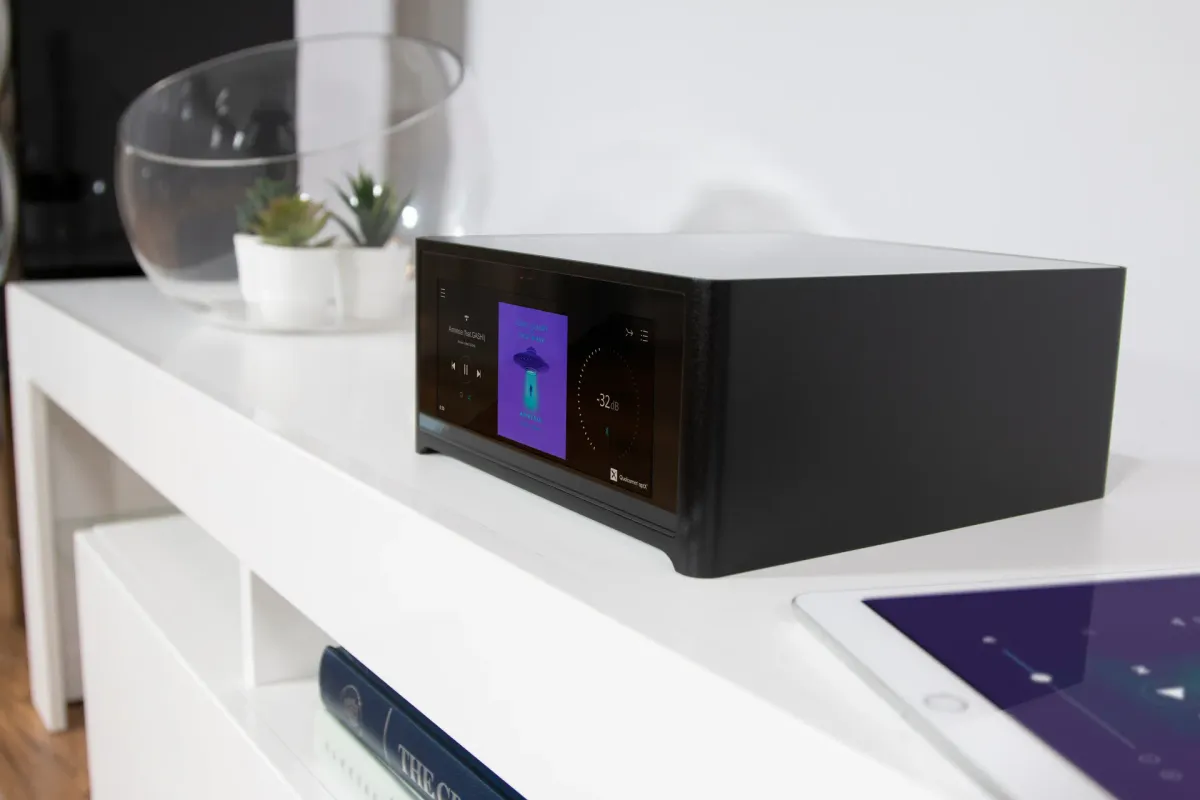 NAD M10 V2 Integrated Streaming Amplifier - [2x100W DAC USB BT Wi-Fi BluOS HDMI Phono] lifestyle view at Toma Audio